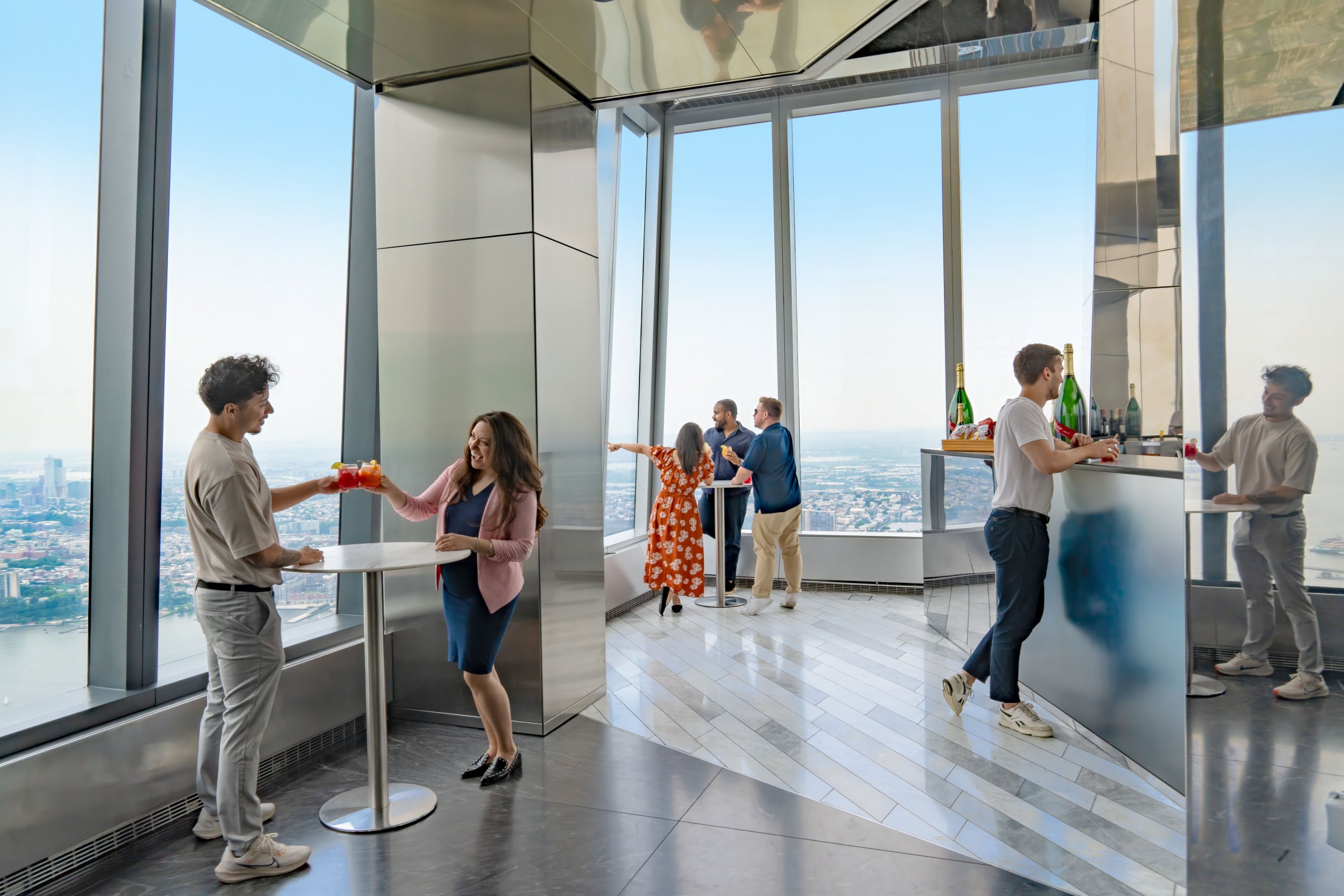 A corporate group enjoys cocktails at The Edge