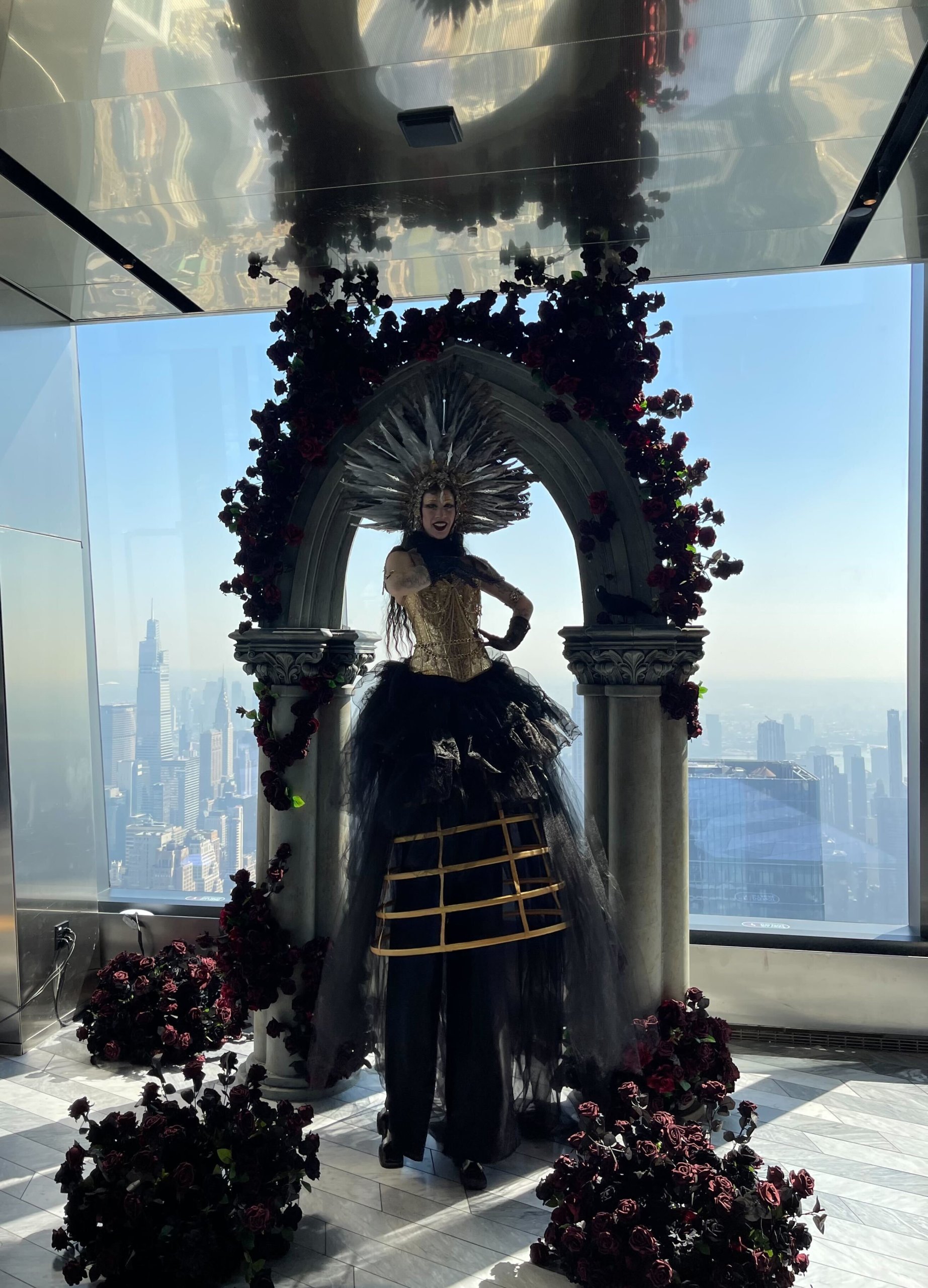 Woman dressed in floral costume for the Garden of Shadows: Evening entertainment